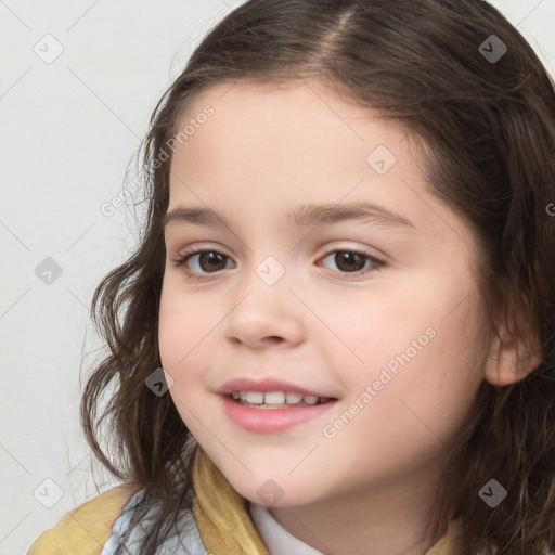 Joyful white child female with medium  brown hair and brown eyes