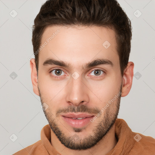 Neutral white young-adult male with short  brown hair and brown eyes