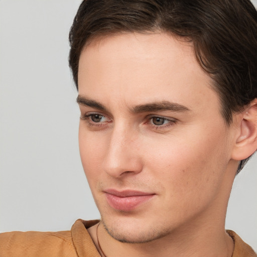 Neutral white young-adult male with short  brown hair and brown eyes