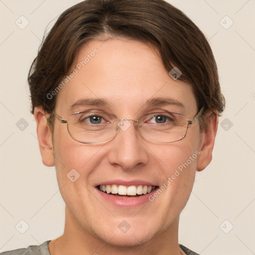 Joyful white adult female with short  brown hair and grey eyes