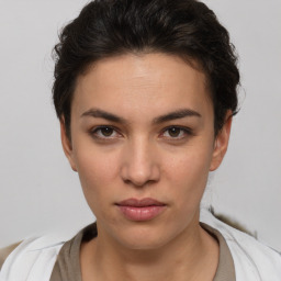 Neutral white young-adult female with short  brown hair and brown eyes