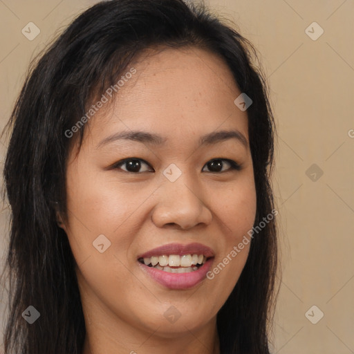 Joyful latino young-adult female with long  brown hair and brown eyes