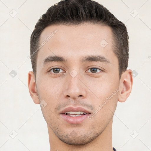 Joyful white young-adult male with short  brown hair and brown eyes