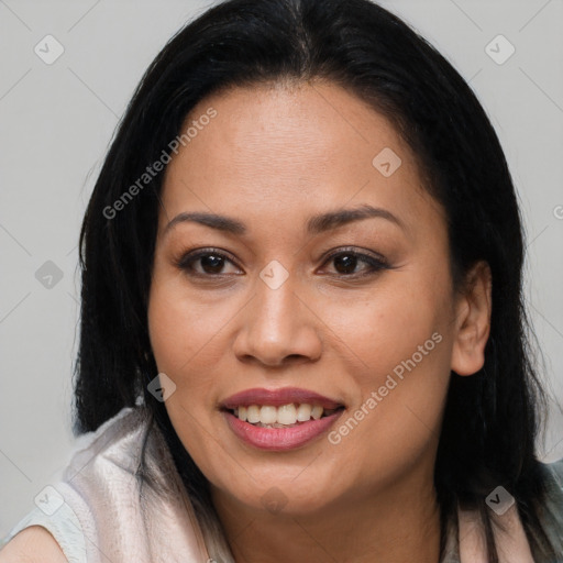 Joyful latino young-adult female with medium  brown hair and brown eyes