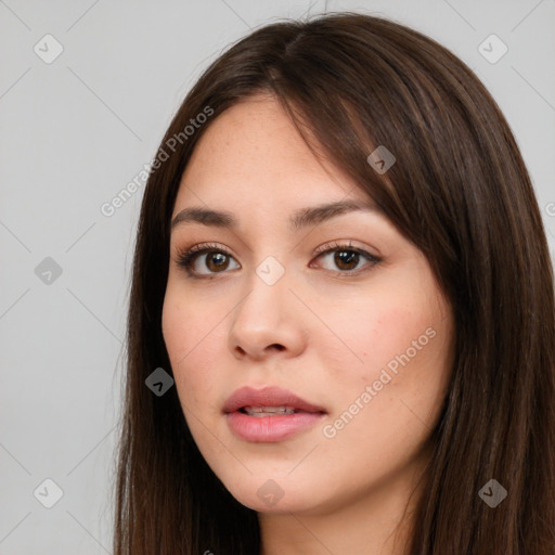 Neutral white young-adult female with long  brown hair and brown eyes