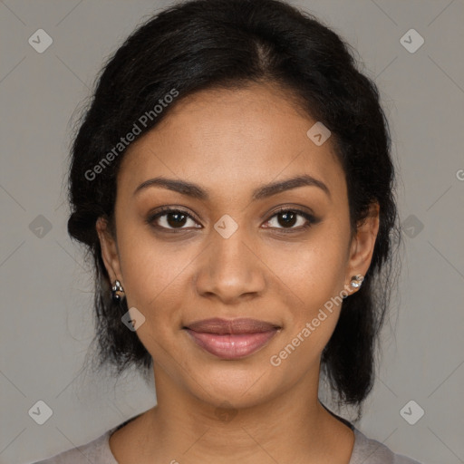 Joyful black young-adult female with medium  brown hair and brown eyes