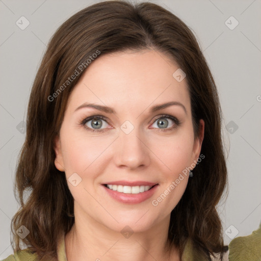 Joyful white young-adult female with medium  brown hair and green eyes