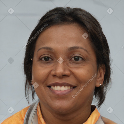 Joyful white adult female with medium  brown hair and brown eyes