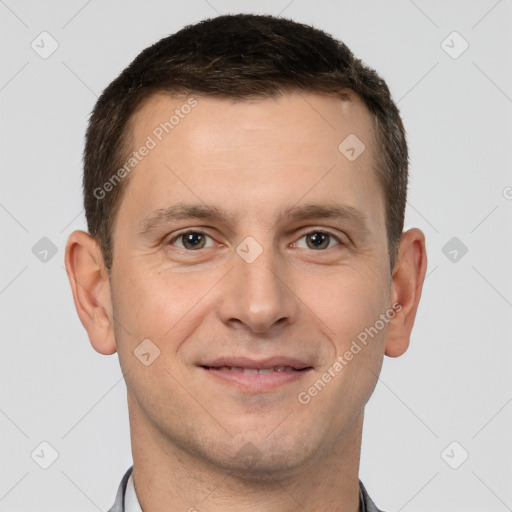 Joyful white young-adult male with short  brown hair and brown eyes