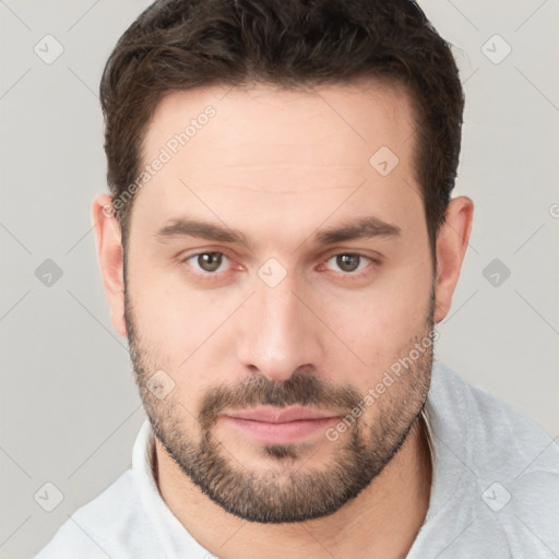 Neutral white young-adult male with short  brown hair and brown eyes