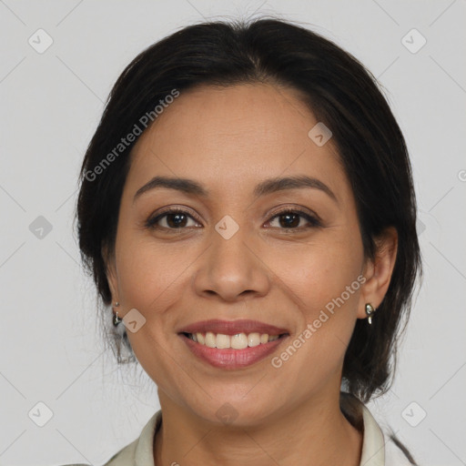 Joyful latino young-adult female with medium  brown hair and brown eyes