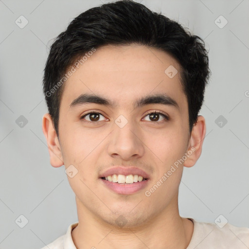 Joyful latino young-adult male with short  black hair and brown eyes