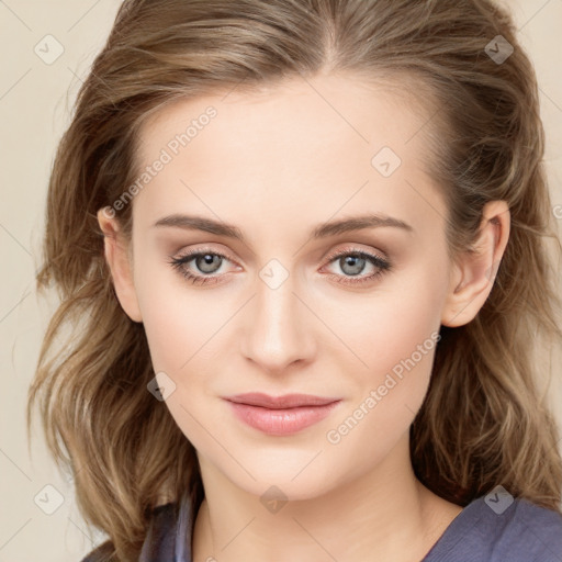 Joyful white young-adult female with long  brown hair and blue eyes