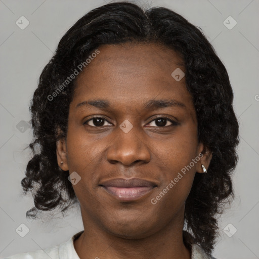 Joyful black young-adult female with medium  brown hair and brown eyes