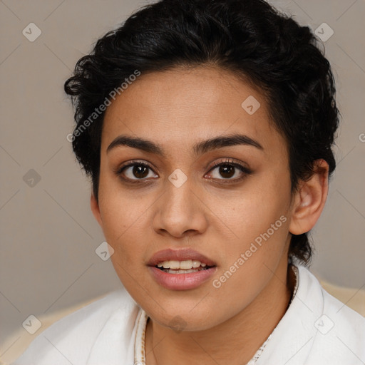 Joyful latino young-adult female with short  brown hair and brown eyes