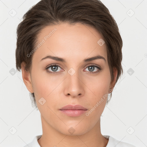 Neutral white young-adult female with short  brown hair and brown eyes