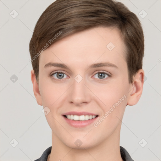 Joyful white young-adult female with short  brown hair and grey eyes