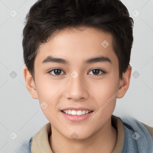 Joyful white child male with short  brown hair and brown eyes