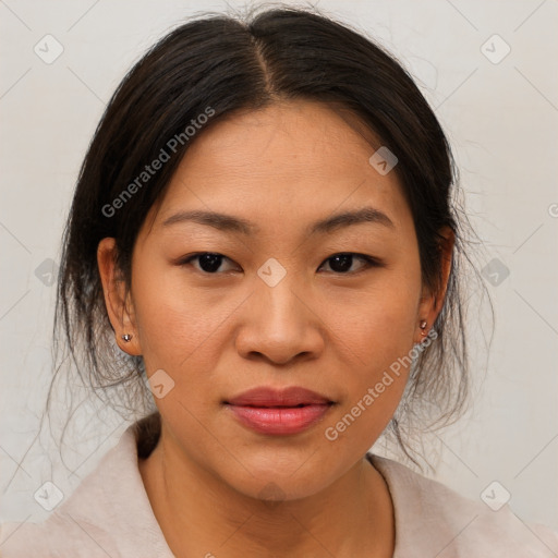 Joyful asian young-adult female with medium  brown hair and brown eyes