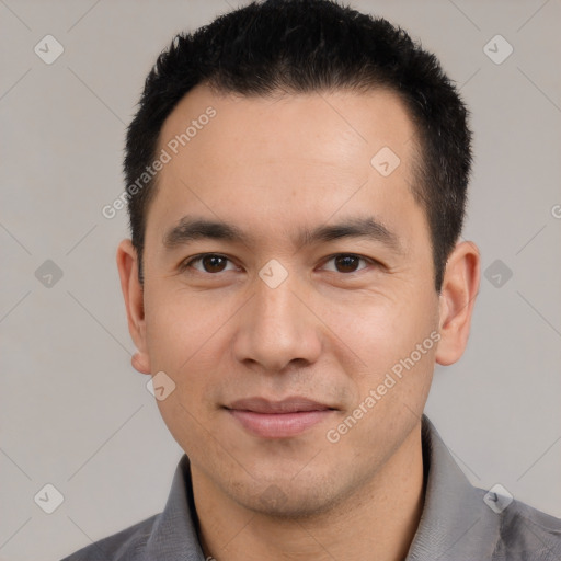 Joyful white young-adult male with short  black hair and brown eyes