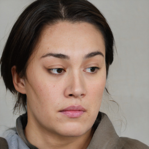 Neutral asian young-adult female with medium  brown hair and brown eyes
