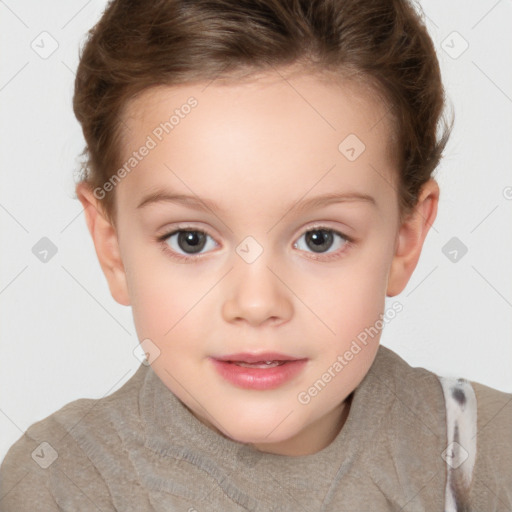 Joyful white child female with short  brown hair and brown eyes