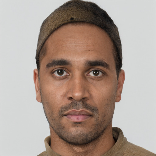 Neutral white adult male with short  black hair and brown eyes