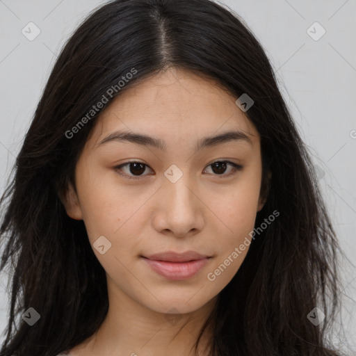 Joyful asian young-adult female with long  brown hair and brown eyes