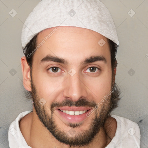 Joyful white young-adult male with short  black hair and brown eyes