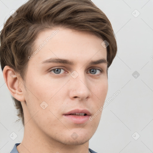 Neutral white young-adult male with short  brown hair and grey eyes