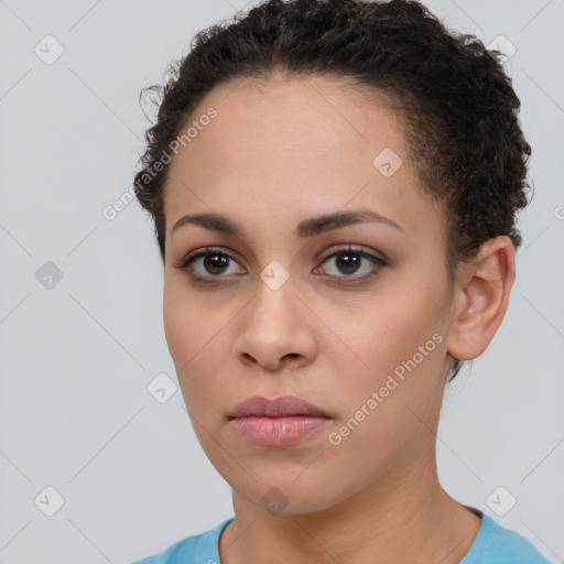 Neutral white young-adult female with short  brown hair and brown eyes