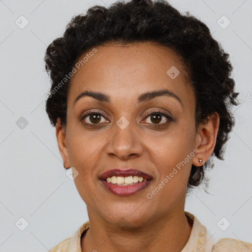 Joyful latino young-adult female with short  brown hair and brown eyes