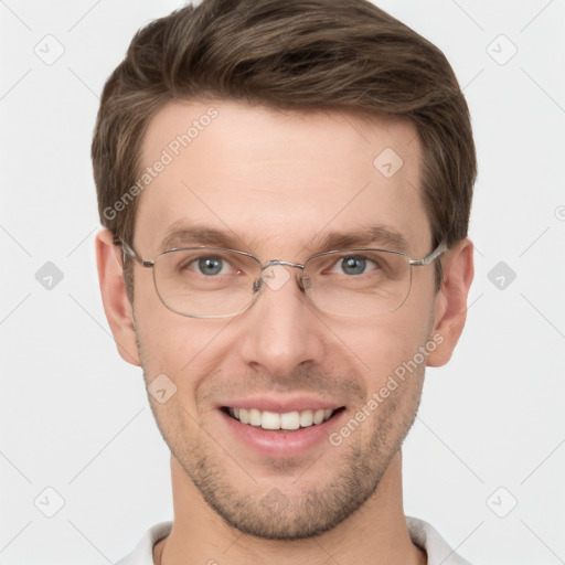 Joyful white adult male with short  brown hair and grey eyes