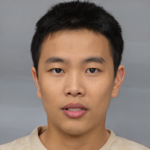 Neutral asian young-adult male with short  brown hair and brown eyes