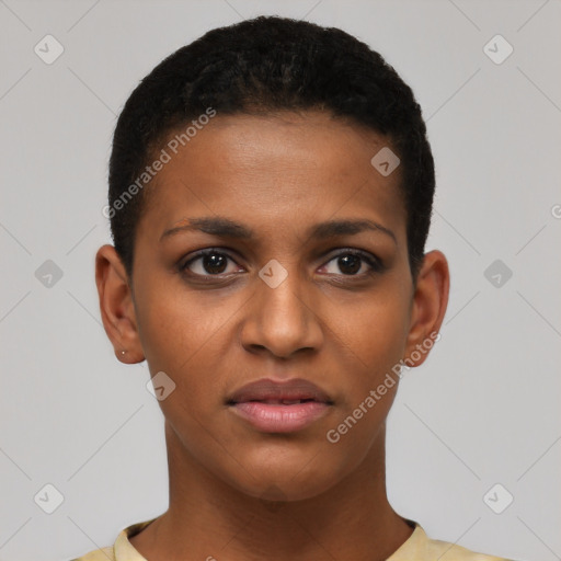 Joyful black young-adult female with short  brown hair and brown eyes