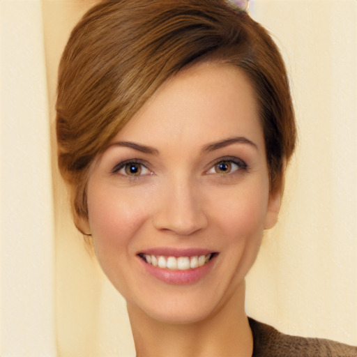 Joyful white young-adult female with medium  brown hair and brown eyes