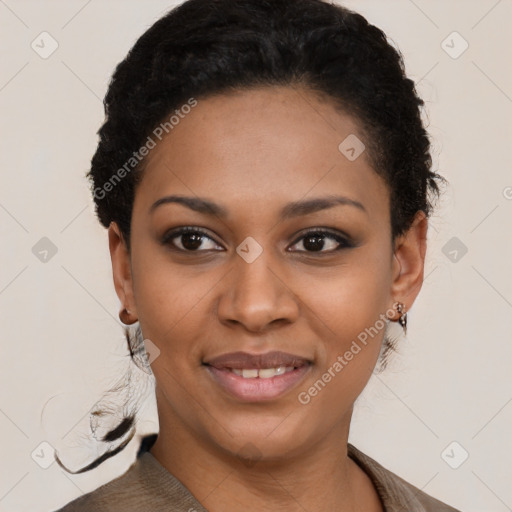 Joyful black young-adult female with short  brown hair and brown eyes