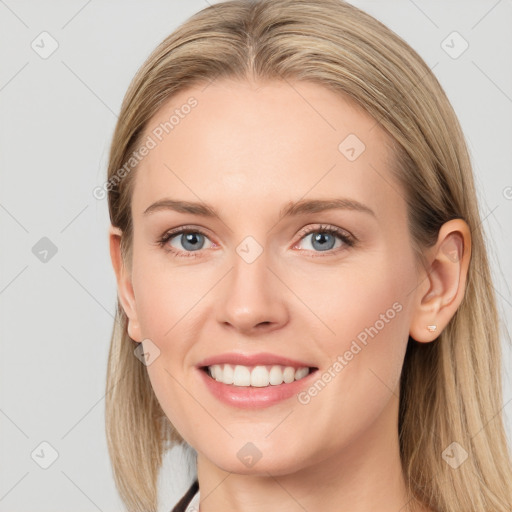 Joyful white young-adult female with long  brown hair and blue eyes