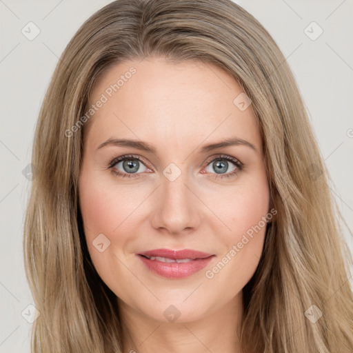 Joyful white young-adult female with long  brown hair and green eyes