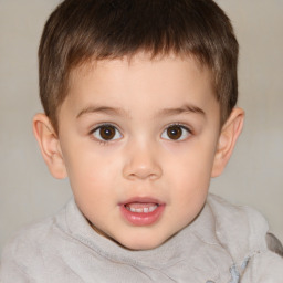 Joyful white child male with short  brown hair and brown eyes