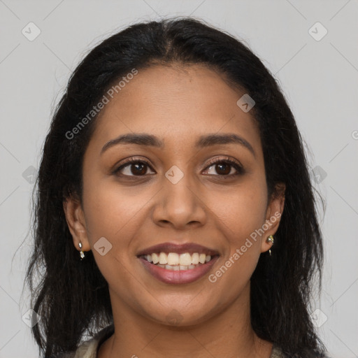 Joyful latino young-adult female with long  brown hair and brown eyes