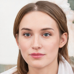 Neutral white young-adult female with long  brown hair and blue eyes