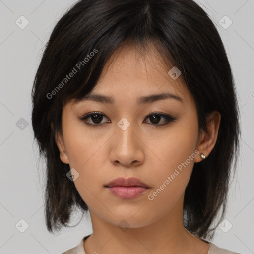 Neutral asian young-adult female with medium  brown hair and brown eyes