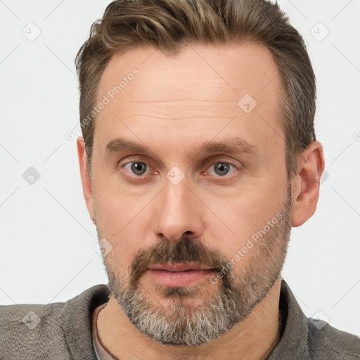 Neutral white adult male with short  brown hair and brown eyes