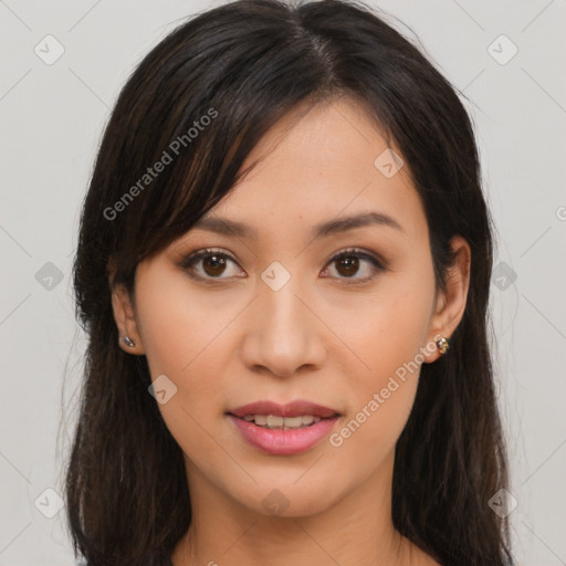 Joyful asian young-adult female with long  brown hair and brown eyes