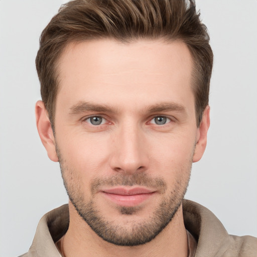 Neutral white young-adult male with short  brown hair and grey eyes