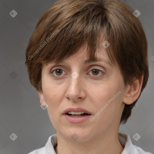 Joyful white adult female with short  brown hair and brown eyes