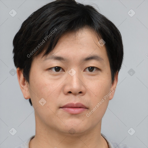 Neutral asian young-adult male with short  brown hair and brown eyes