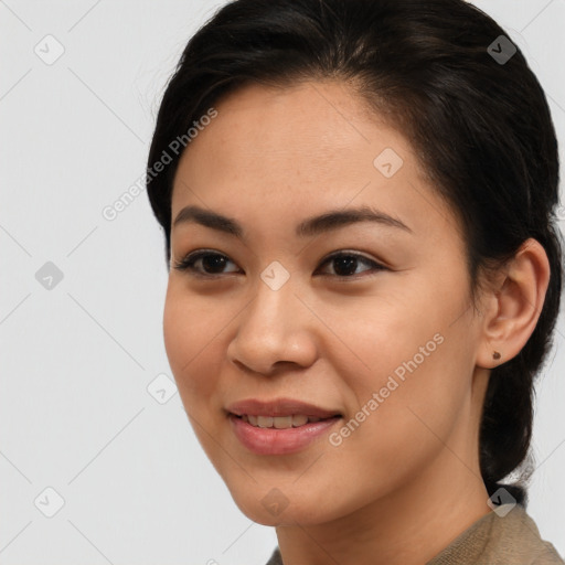 Joyful latino young-adult female with short  brown hair and brown eyes