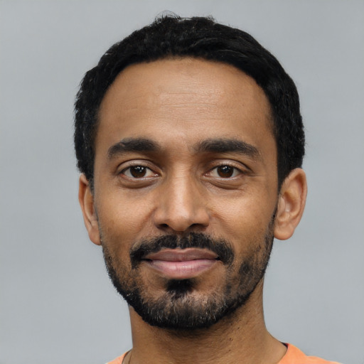 Neutral black young-adult male with short  black hair and brown eyes